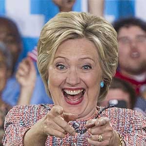 TOPSHOT - US Democratic Presidential candidate Hillary Clinton arrives for a campaign rally with US Senator Tim Kaine, Democrat of Virginia, at Ernst Community Cultural Center in Annandale, Virginia, July 14, 2016. (Saul Loeb/AFP/Getty Images)