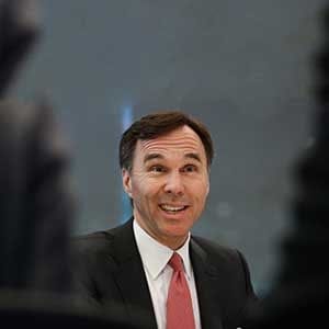 Bill Morneau, Canada's finance minister, speaks during an interview in New York, U.S., on Wednesday, March 30, 2016. Changes to Canada's capital gains taxation rules are not part of Prime Minister Justin Trudeau's plan as he looks for C$3 billion in revenue from changes to the country's tax code, Morneau said. (Chris Goodney/Bloomberg/Getty Images)