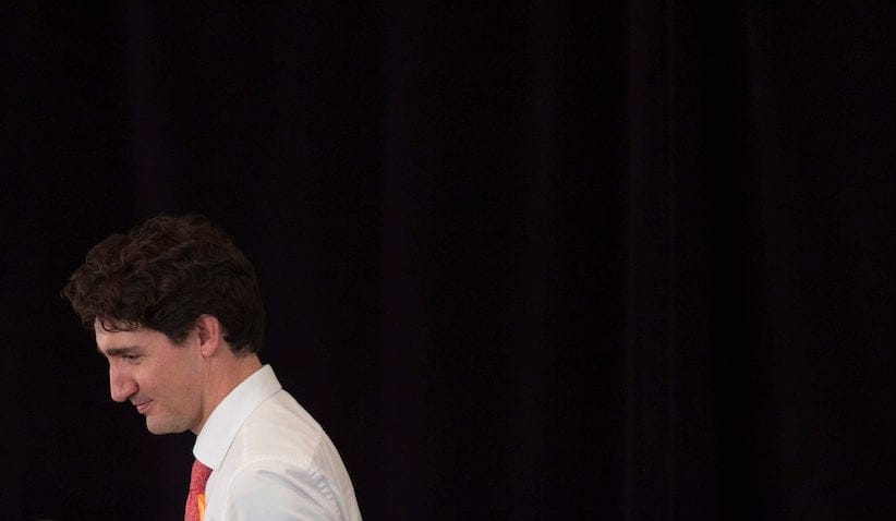 Canadian Prime Minister Justin Trudeau leaves the stage following a discussion on women's leadership, Thursday, November 24, 2016 in Monrovia, Liberia. (Adrian Wyld/CP)