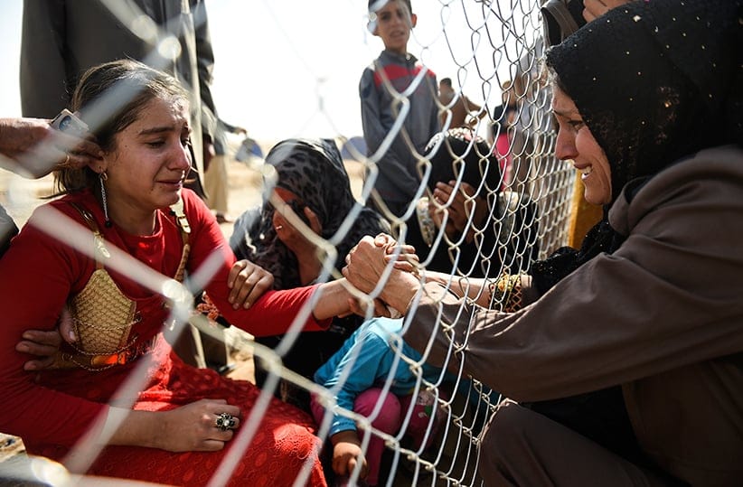 Newly displaced Iraqi's who fled from the city of Mosul, Iraq's last major Islamic State (IS) group stronghold, cry as they are reunited with their relatives who came two years ago to the refugee camp in the Khazir area, near near the Kurdish checkpoint of Aksi Kalak, some 40 kilometres east of Arbil following their arrival on October 26, 2016. 
The United Nations Office for the Coordination of Humanitarian Affairs (OCHA) Stephane Dujarric told reporters that almost 9,000 people are internally displaced as a result of the Mosul military operation in Iraq. Lise Grande, the U.N. humanitarian coordinator for Iraq, said the military operations to retake Mosul could spark the largest humanitarian crisis in 2016 as the security situation in the area restrains aid agencies' ability to deliver help. (Bulent Kilic/AFP/Getty Images)