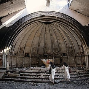 Nuns from the Syriac Catholic Dominican Sisters of Saint Catherine of Sienna visit churches in the  predominantly Christian town of Qaraqosh for the first time in more than two years. Islamic State has wreaked havoc in towns and villages during its retreat in northern Iraq. (Photograph by Adnan R. Khan)
