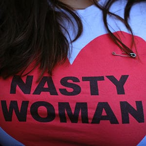 A woman wears a safety pins as a sign of solidarity against intolerance during a rally against US President-elect Donald Trump in Union Square on November 12, 2016 in New York.
Americans spilled into the streets Saturday for a new day of protests against Donald Trump, even as the president-elect appeared to back away from the fiery rhetoric that propelled him to the White House. (Kena Betancur/AFP/Getty Images)