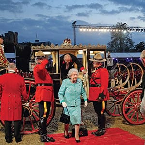 Queen Elizabeth II is greeted by Prince Charles,  Prince of Wales as she arrives for the final night of her 90th Birthday Celebrations at Windsor on May 15, 2016 in Windsor, England.  (Chris Jackson/WPA/Getty Images)