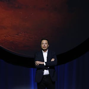 Elon Musk, chief executive officer for Space Exploration Technologies Corp. (SpaceX), pauses during the 67th International Astronautical Congress (IAC) in Guadalajara, Mexico, on Tuesday, Sept. 27, 2016. Musk delivered a keynote address at the conference titled "Making Humans a Multiplanetary Species" and tackled the technical challenges and "potential architectures for colonizing the Red Planet." (Susana Gonzalez/Bloomberg/Getty Images)