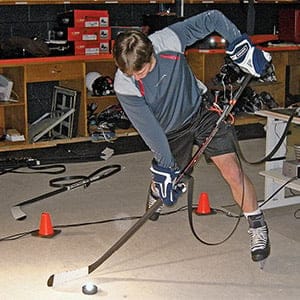 Testing of the hockey sticks with built in strain and grip force sensors to better understand the mechanical interaction of user and tool (player and stick) at McGill’s Ice Hockey Research Group’s laboratory. (Ice Hockey Research Group/McGill)