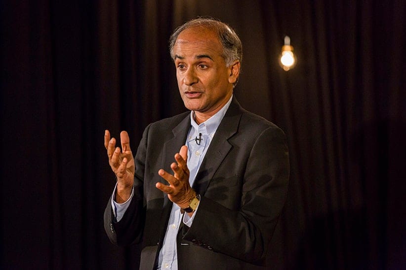 In this Aug. 6, 2014 photo provided by TED, Pico Iyer speaks at the TED@250, The Non-Fiction Edition, TED head quarters, in New York. Iyer has spent the past several decades on the move, incessantly hopping from one far-flung destination _ Ethiopia, Morocco, Indonesia _ to another. But the globetrotting travel writer is now convinced the most exciting place to go is nowhere at all. (Ryan Lash/TED/AP/CP)