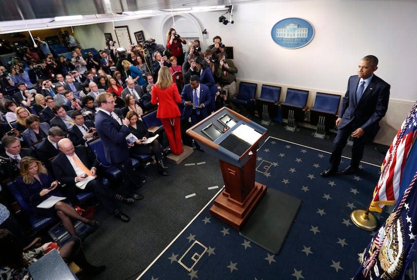 President Barack Obama walks up to begin his final presidential news conference, Wednesday, Jan. 18, 2017, in the briefing room of the white House in Washington.(AP Photo/Pablo Martinez Monsivais)