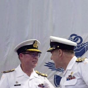 Royal Canadian Navy Vice-Admiral Mark Norman (left) speaks with Vice-Admiral Ron Lloyd during a change of command ceremony, Thursday, June 23, 2016 in Ottawa. Norman, one of the military's highest ranking officers, has been temporarily removed from his post. (Adrian Wyld/CP)