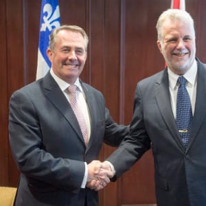 Quebec Premier Philippe Couillard, right, greets British Secretary of State for International Trade Liam Fox before their meeting Friday, January 27, 2017 in Montreal. (Ryan Remiorz/CP)