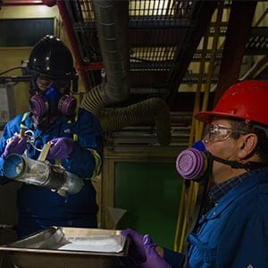 Chemical engineer Hena Farooqi, left, and physical scientist Behnam Namsechi the process of the testing in the spill tank at CanmetENERGY in Devon, Alberta on Thursday, December 15, 2016. They are part of a team are studying the complex factors, including temperature, type of petroleum product, salinity, and amount of agitation, that affect outcome after a spill into water.  Amber Bracken