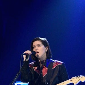Pictured: (l-r) Romy Madley Croft, Jamie xx, and Oliver Sim of musical guest The xx perform on Saturday Night live on November 19, 2016. (Will Heath/NBC/Getty Images)