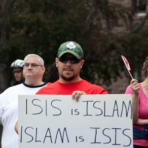 Protesters demonstrate during a Pegida Canada rally at Queens Park in Toronto, Canada on September 19, 2015. Pegida Canada is an organization that aims to stop the Islamization of the west.  (Reynaldo Vasconcelos/CP)