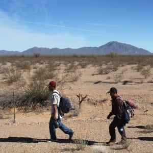Undocumented Mexican immigrants walk through the Sonoran Desert after illegally crossing the U.S.-Mexico border border on January 19, 2011 into the Tohono O'odham Nation, Arizona. The immigrants said they had wandered the desert lost for a week after crossing from Mexico into the vast Indian reservation at night. Exhausted, they requested the Border Patrol to pick them up and take them to the U.S.-Mexico border, from where they would return to their homes in the Mexican state of Sonora. They had come, they said, to reach Phoenix and find work in construction or landscaping. All said they had worked in Arizona before.  (John Moore/Getty Images)