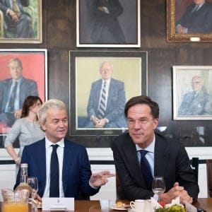 Geert Wilders, leader of the Dutch Freedom Party (PVV), left, and Mark Rutte, Dutch prime minister and leader of the Liberal Party (VVD), speak during a meeting at the House of Representatives at the Dutch Parliament following the national elections in The Hague, Netherlands, on Thursday, March 16, 2017. Dutch voters turned out in force to back pro-European parties and help Prime Minister Mark Ruttes Liberals easily beat off an election challenge by the anti-Islam Freedom Party of Geert Wilders, drawing a line in the sand over the spread of populism. (Jasper Juinen/Bloomberg/Getty Images)
