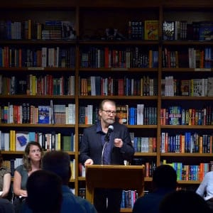 Author George Saunders, reads from his new book "Lincoln in the Bardo" with the help of (L-R) Cristina Russell, Gaël LeLamer, Viv Evans, Cristina Nosti and Katherine Wakefield at Books and Books on February 19, 2017 in Coral Gables, Florida.  (Johnny Louis/FilmMagic/Getty Images)