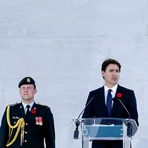 Canadian Prime Minister Justin Trudeau addresses the audience during a ceremony marking the 100th anniversary of the Battle of Vimy Ridge at the WWI Canadian National Vimy Memorial in Givenchy-en-Gohelle, France on Sunday, April 9, 2017. The commemorative ceremony at the memorial honors Canadian soldiers who were killed or wounded during the Battle of Vimy Ridge in April 1917. (Virginia Mayo/AP/CP)