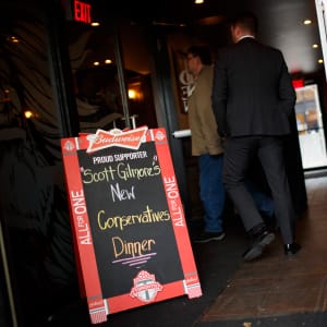 People arrive to Scott Gilmore's New Conservative's Dinner at Brazen Head Pub in Toronto, Ontario on Tuesday, April 25, 2017.   (Photo by Cole Burston)