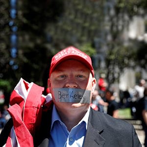A man looks on as opposing factions gather over the cancelation of conservative commentator Ann Coulter's speech at the University of California, Berkeley, in Berkeley, California, U.S., April 27, 2017.   (Stephen Lam/Reuters)