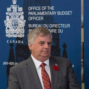 Parliamentary Budget Officer Jean-Denis Frechette is seen before speaking with the media, in Ottawa on Tuesday, November 1, 2016. THE CANADIAN PRESS/Adrian Wyld