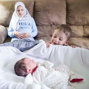 Friday, May 05, 2017 - Calgary, Alberta - Afraa and Moehamad Bilal welcomed a baby boy, Justin-Trudeau Adam Bilal, on Thursday May 04 born at 6:16 p.m. weighing seven pounds, seven ounces. The refugee couple living in Calgary gave the name to their newborn baby as a thanks to Prime Minister Trudeau after working to bring Syrian refugees to Canada. The now family of five, arrived in Canada on February 05, 2016 after leaving war-torn Syria. Their daughter Naya, 4 and son Nael, age 3 are excited for their little brother and new life in Canada. Photo by Chris Bolin / Macleans Magainze