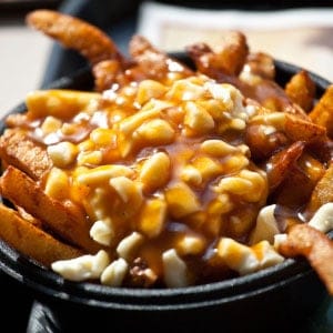 Poutine at La Belle Province restaurant in Montreal, Canada. (dbimages/Alamy)