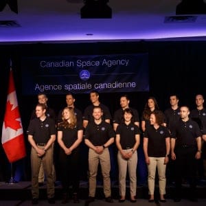 Navdeep Bains, left, Minister of Innovation, Science, and Economic Development introduces the top 17 candidates to be the next Canadian Space Agency astronaut, during a press conference in Toronto on Monday, April 24, 2017. (Cole Burston/CP)