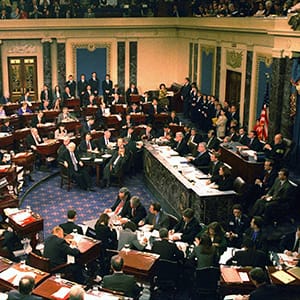 WASHINGTON,D.C. - FEBRUARY 11: The US Senate votes in its trial against impeached US President Bill Clinton on  February 12,1999  in Capitol Hill in Washington, DC. Clinton escaped removal from office and declared himself "profoundly sorry" for the year-long ordeal that led to his acquittal in the Senate impeachment trial. (AFP/Getty Images)