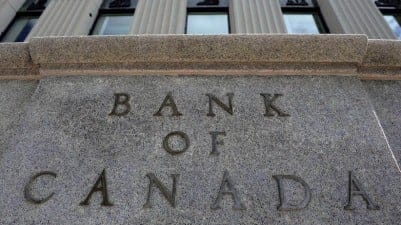 Canada's central bank expects higher interest rates next year, at the same time nearly one in two Canadian mortgages is up for renewal. THE CANADIAN PRESS/Sean Kilpatrick