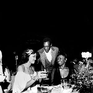 UNITED STATES - CIRCA 1970:  Photo of Phyllis Hyman, Phyllis Hyman, Bill Cosby and Natalie Cole at the Black Athletes Hall of Fame Awards Dinner in New York Citymid 1970s.  (Michael Ochs Archives/Getty Images)