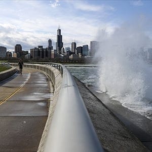 CHICAGO, USA - APRIL 06:  Waves break on the walking track along the Lake Michigan in Chicago, United States on April 6, 2017. Food warnings have been issued due to the strong winds and lakefront trail was closed as precautionary measure.

 (Bilgin S. Sasmaz/Anadolu Agency/Getty Images)