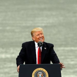 U.S. President Donald Trump announces his $1 trillion infrastructure plan to the crowd during a rally alongside the Ohio River at the Rivertowne Marina in Cincinnati, Ohio, U.S. June 7, 2017. REUTERS/John Sommers II - RTX39IES