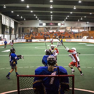 British Columbia players protect the ball during women's lacrosse action against Ontario, during the North American Indigenous Games at the Iroquois Lacrosse Arena in Hagerville, Ontario, on Monday, July 17, 2017. (Chris Young/CP)