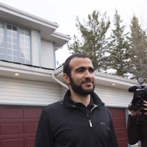 Omar Khadr walks to meet the press before a news conference after being released on bail in Edmonton, Alberta, May 7, 2015. Khadr, a Canadian, was once the youngest prisoner held on terror charges at Guantanamo Bay. (Todd Korol/Reuters)