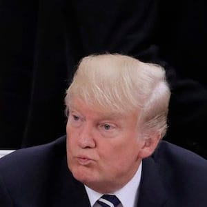 U.S. President Donald Trump waits for the beginning of the first working session on the first day of the G-20 summit in Hamburg, northern Germany, Friday, July 7, 2017. The leaders of the group of 20 meet July 7 and 8. (AP Photo/Markus Schreiber)