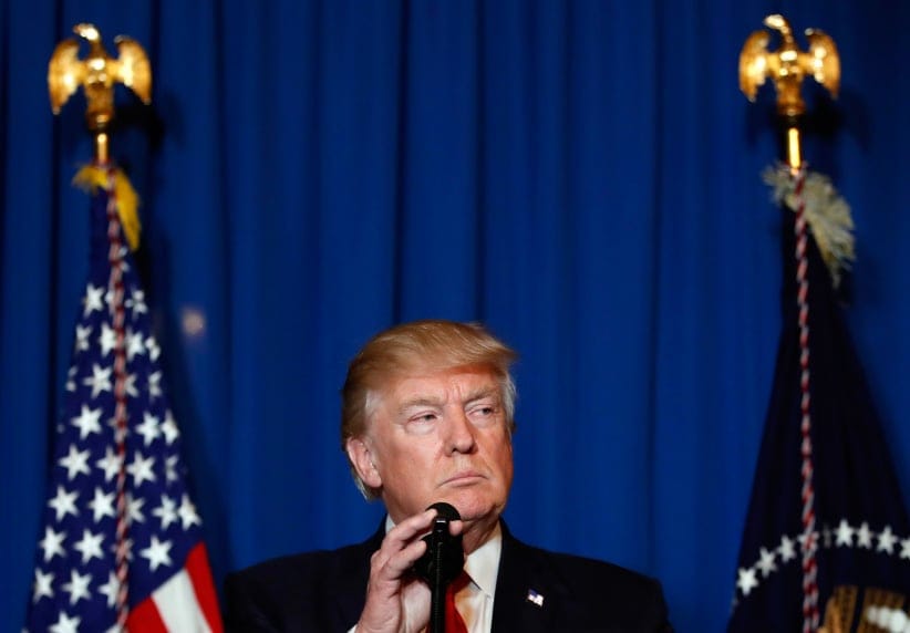 President Donald Trump prepares to speak at Mar-a-Lago in Palm Beach, Fla., Thursday, April 6, 2017, after the U.S. fired a barrage of cruise missiles into Syria Thursday night in retaliation for this week's gruesome chemical weapons attack against civilians. (Alex Brandon/AP/CP)