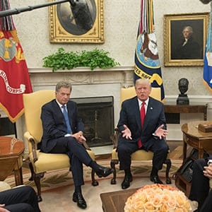 WASHINGTON, DC - AUGUST 28: US President Donald J. Trump (C) delivers remarks to members of the news media during his meeting with President Sauli Niinisto (L) of Finland, US Secretary of State Rex Tillerson (R) and US Vice President Mike Pence (2-R)  in the Oval Office of the White House on August 28, 2017 in Washington, D.C. (Photo by Michael Reynolds-Pool/Getty Images)