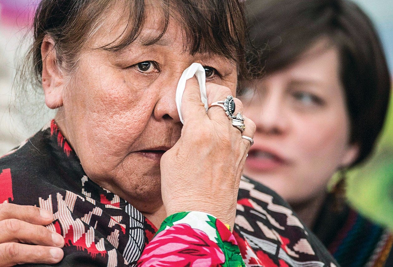 Bella Bresse wipes away a tear as she speaks about her murdered daughter, Evangeline Billy, at the National Inquiry into Missing and Murdered Indigenous Women and Girls taking place in Whitehorse, YT., Wednesday, May 31, 2017. (Jonathan Hayward/CP)