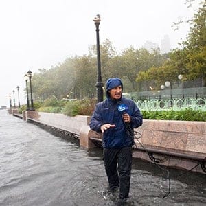 Jim Cantore, an on-camera meteorologist for The Weather Channel, reports on Hurricane Irene from Battery Park August 28, 2011 in New York City. The center of the hurricane made land fall at Coney Island in New York causing flooding in parts of the city. (Jonathan Saruk/The Weather Channel/Getty Images)