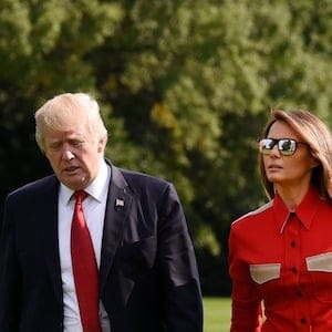WASHINGTON, DC - SEPTEMBER 10:  (AFP OUT)  US President Donald Trump and First Lady Melania Trump walk from Marine One upon arrival on the South Lawn of the White House September 10, 2017 in Washington, DC  Trump spent the weekend at Camp David, the Presidential retreat in Maryland. (Photo by Olivier Douliery-Pool/Getty Images)