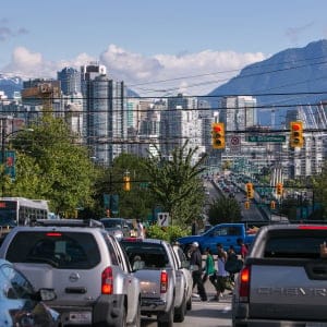 Traffic along Cambie Street in Vancouver, Canada. (Photo by George Rose/Getty Images)
