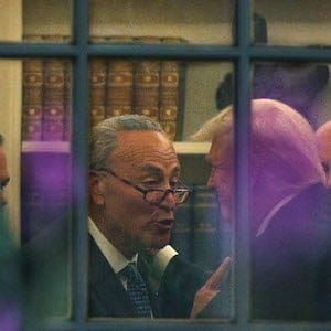 WASHINGTON, DC - SEPTEMBER 06:  U.S. Senate Minority Leader Chuck Schumer (D-NY) (L) makes a point to President Donald Trump in the Oval Office prior to his departure from the White House September 6, 2017 in Washington, DC. President Trump is traveling to North Dakota for a tax reform event with workers from the energy sector.  (Photo by Alex Wong/Getty Images)