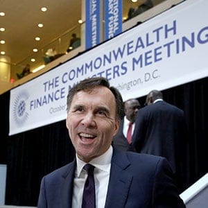 Canadian finance minister Bill Morneau (C) reacts after The Commonwealth Finance  Ministers meeting family photo during the IMF/World Bank annual meetings in Washington, U.S., October 12, 2017. (Yuri Gripas/Reuters)