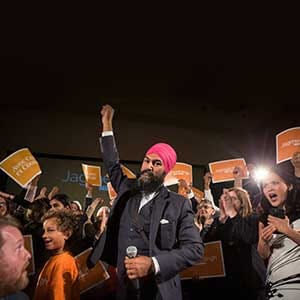 Jagmeet Singh celebrates with supporters after winning the first ballot in the NDP leadership race to be elected the leader of the federal New Democrats in Toronto on Sunday, October 1, 2017. THE CANADIAN PRESS/Chris Young