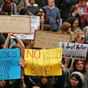 Protesters hold placards aloft during a Slutwalk march for the right of women to wear what they want without harassment on May 28, 2011 in Melbourne, Australia. The Slutwalk began with a small protest in Toronto, Canada, when women marched against a policeman who claimed he was told women should "avoid dressing like sluts in order not to be victimized". Slutwalks are scheduled for Adeleaide and Sydney as well as other cities in North America and Europe. (Scott Barbour/Getty Images)