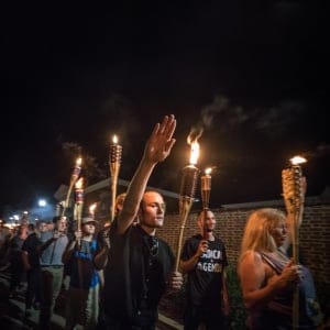 Chanting White lives matter! You will not replace us! and Jews will not replace us! several hundred white nationalists and white supremacists carrying torches marched in a parade through the University of Virginia campus last night. Beginning a little after 9:30 p.m., the march lasted 15 to 20 minutes before ending in skirmishing when the marchers were met by a small group of counterprotesters at the base of a statue of Thomas Jefferson, the universitys founder. (Evelyn Hockstein/For The Washington Post/Getty Images)