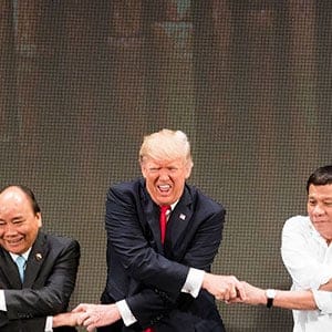 From left: Prayut Cha-O-Cha, prime minister of Thailand; Dmitry Medvedev, prime minister of Russia; Nguyen Xuan Phuc, prime minister of Vietnam; President Donald Trump; President Rodrigo Duterte of the Philippines; Malcolm Turnbull, prime minister of Australia; and Lee Hsien Loong, prime minister of Singapore, shake hands at the opening ceremony of the Association of Southeast Asian Nations summit in Manila, Philippines, Nov. 13, 2017. (Doug Mills/The New York Times)