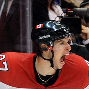 Sidney Crosby #87 of Canada celebrates after scoring the matchwinning goal in overtime during the ice hockey men's gold medal game between USA and Canada on day 17 of the Vancouver 2010 Winter Olympics at Canada Hockey Place on February 28, 2010 in Vancouver, Canada.  (Harry How/Getty Images)
