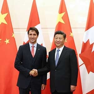 BEIJING, CHINA - AUGUST 31:  Chinese President Xi Jinping (R) shakes hands with Canadian Premier Justin Trudeau ahead of their meeting at the Diaoyutai State Guesthouse in Beijing, China, 31 August 2016. The Canadian Premier Justin Trudeau is on an official visit and is expected to meet with Chinese counterparts to boost bilateral ties. (Photo by Wu Hong - Pool/Getty Images)