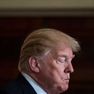 WASHINGTON, DC - JANUARY 10: President Donald Trump listens during a news conference with Norwegian Prime Minster Erna Solberg in the East Room at the White House in Washington, DC on Wednesday, Jan. 10, 2018. (Photo by Jabin Botsford/The Washington Post via Getty Images)
