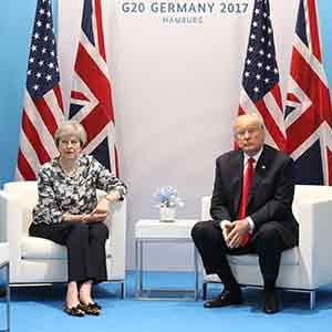 HAMBURG, GERMANY - JULY 08:  British Prime Minister Theresa May meets U.S President Donald Trump during the G20 summit on July 8, 2017 in Hamburg, Germany. Leaders of the G20 group of nations are meeting for the July 7-8 summit. Topics high on the agenda for the summit include climate policy and development programs for African economies.  (Photo by Matt Cardy/Getty Images)